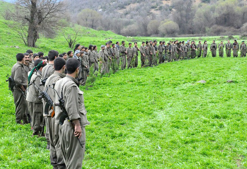 Kurdistan Workers Party fighters standing beside each other