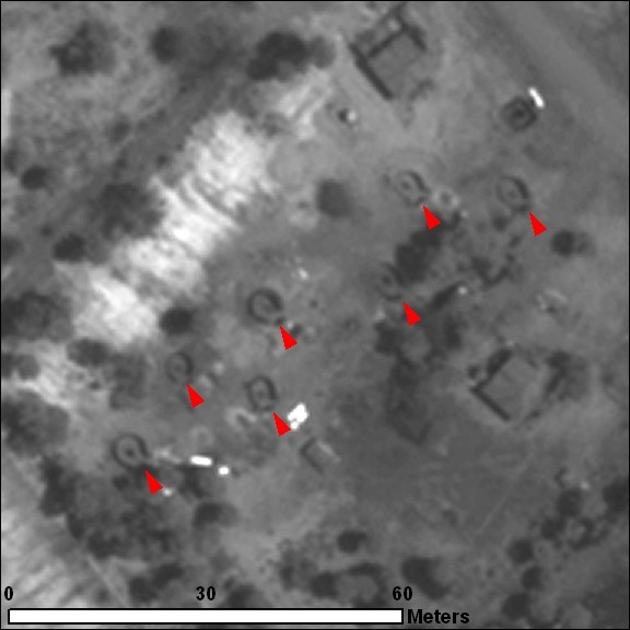 Possible mortar craters landing in a 'Lazy W' formation (left) as detailed in a US military manual (right).